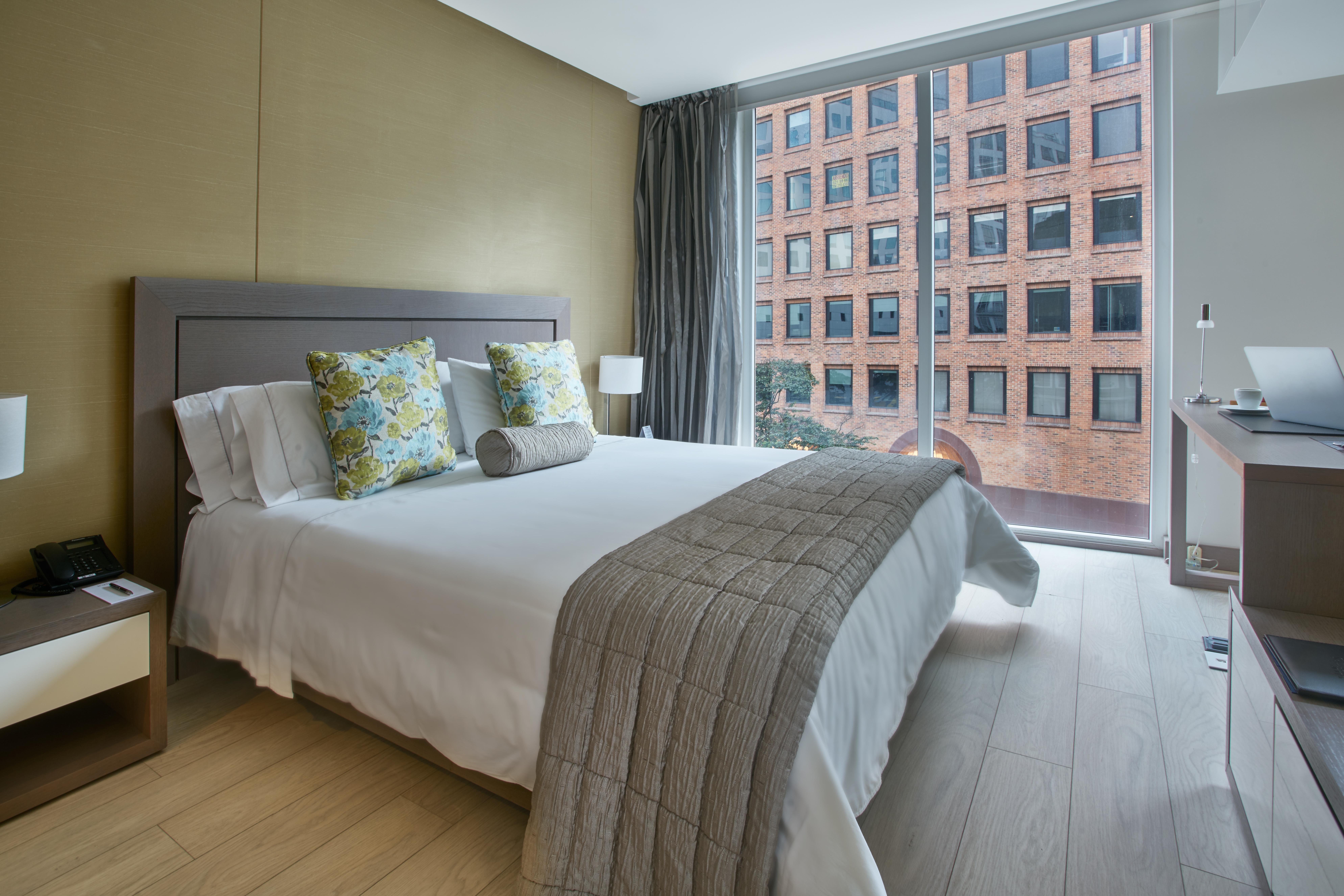 Hotel 100 Luxury Suites By Preferred Bogota Ngoại thất bức ảnh A bedroom at the hotel