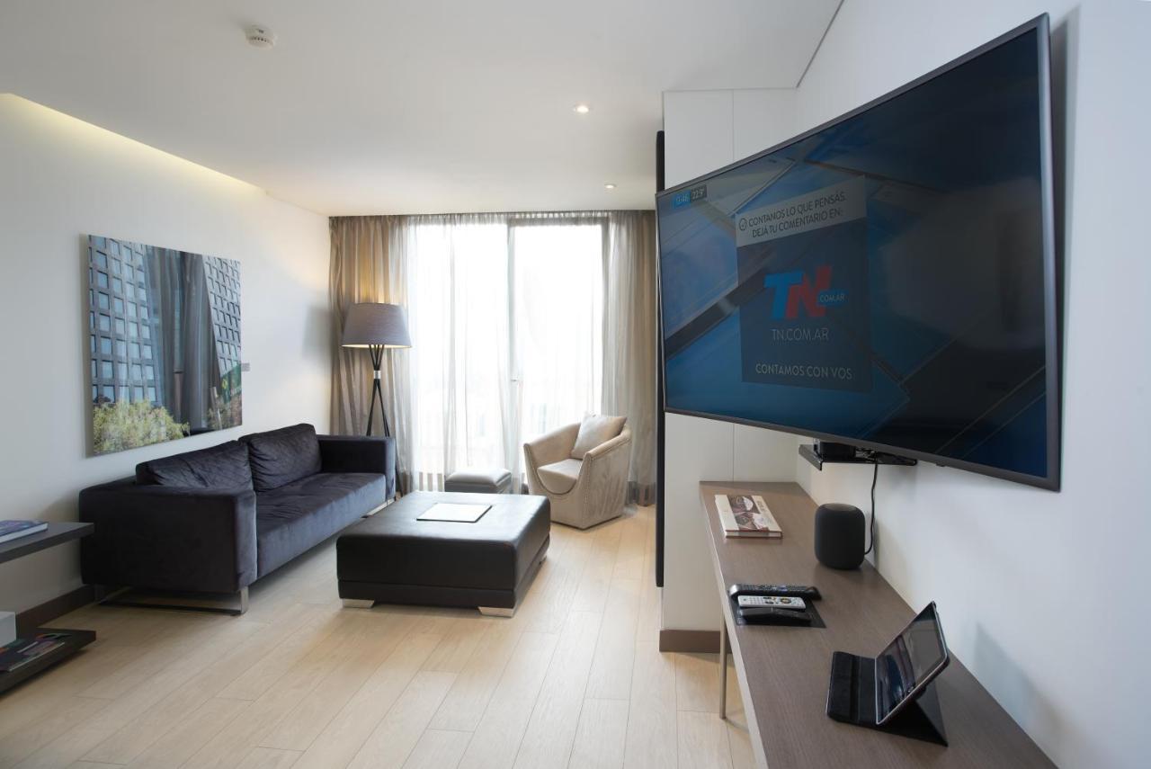 Hotel 100 Luxury Suites By Preferred Bogota Ngoại thất bức ảnh A television set in a hotel room